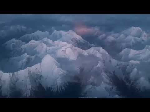 PIA flying over the Hindukush, with majestic Tirich Mir standing tall beneath the wings