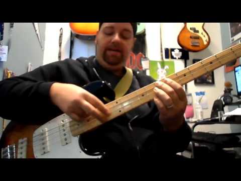 tapping chords on bass while walking. Bass tap lesson.
