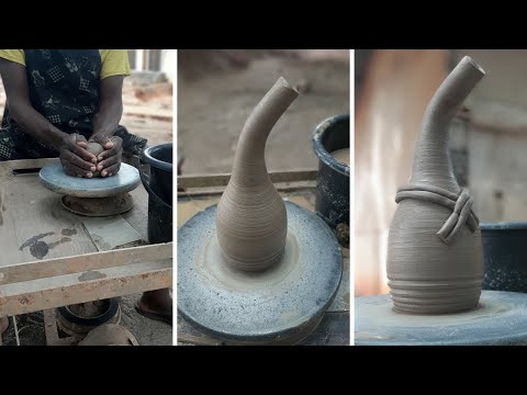 Throwing/Making a tall long - bent necked vase on the potters wheel