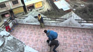 preview picture of video 'The Kids Playing Chungi On Rooftop; Phutung, Nepal'