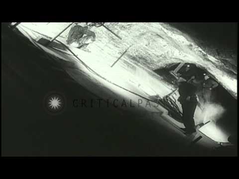 The miners work on various machines while mining salt from Malagash salt mine in ...HD Stock Footage