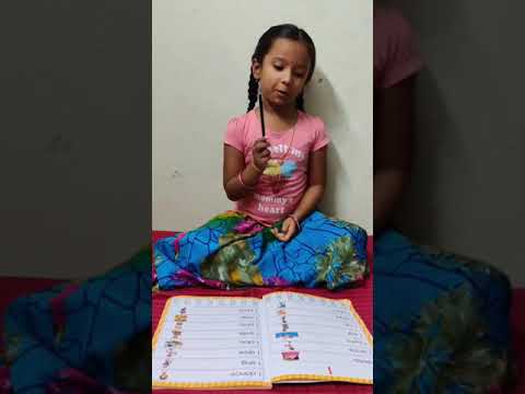 Anarghya Girish of Ukg- E section Reading sentences .