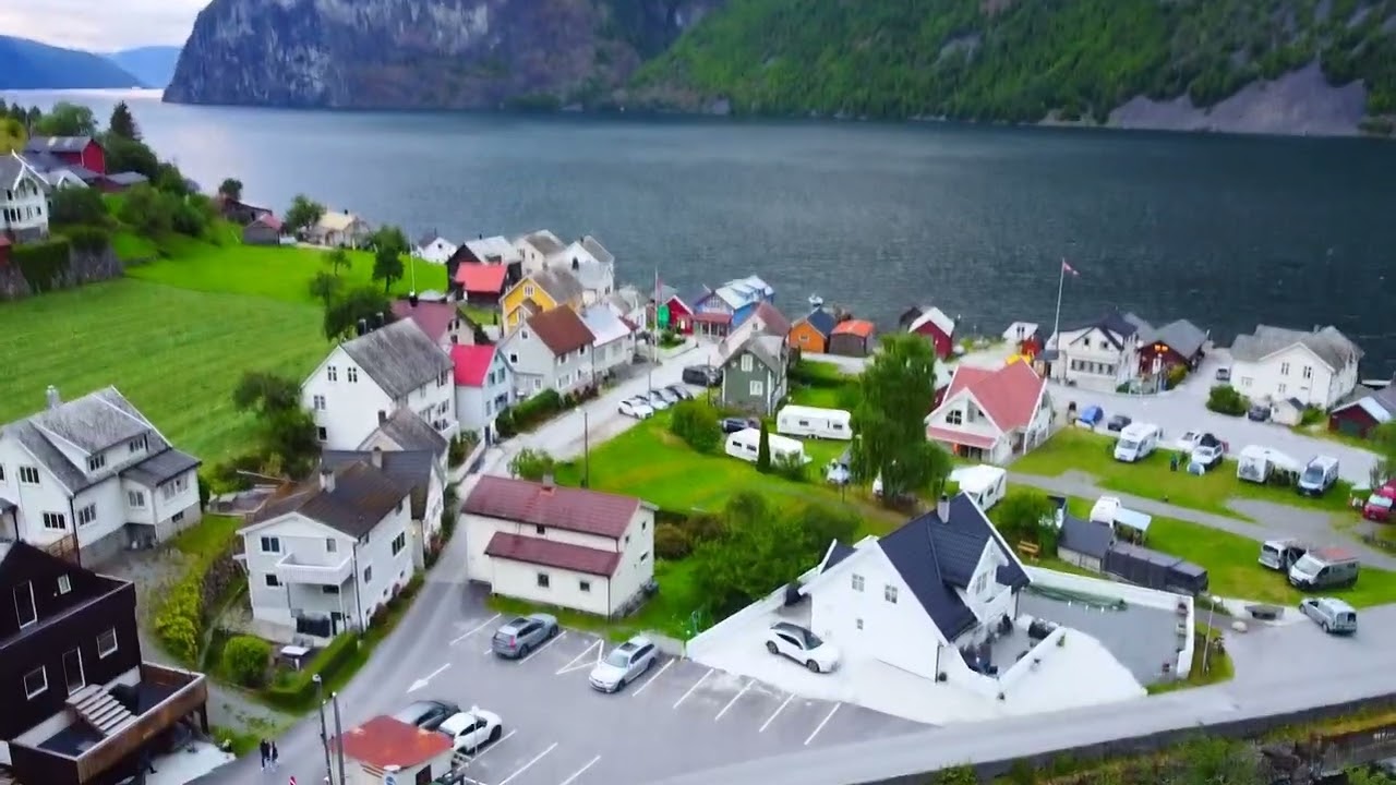 Watch Undredal Village unfold from the skies with wide views.