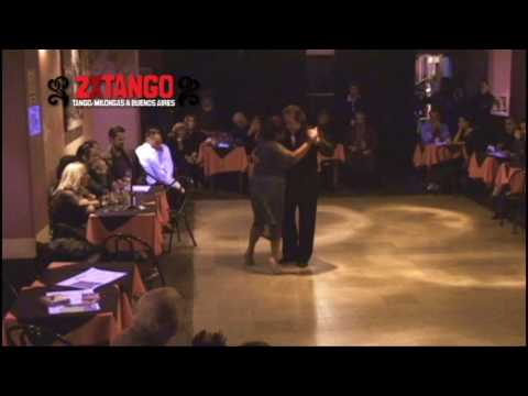  María del Carmen Romero  and  Jorge Dispari  are  dancing  to  the  milonga  "  Cacareando  "