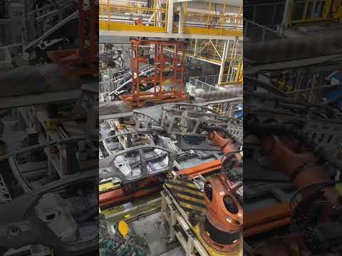 Thumbnail for Robots installing car side panels, from the GAC Group factory by GAC Group