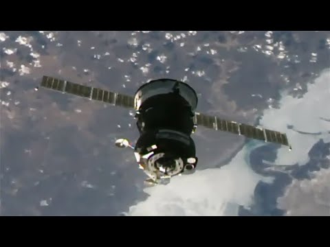 Soyuz Crew Ship Docks to Station With Expedition 65 Trio