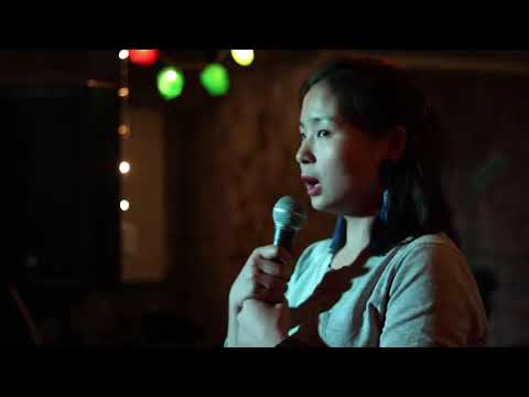 Asian girl answering western questions