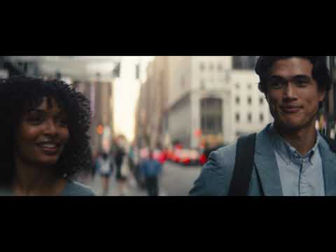 Official trailer thumbnail for The Sun Is Also a Star with Natasha and Daniel against a New York skyline