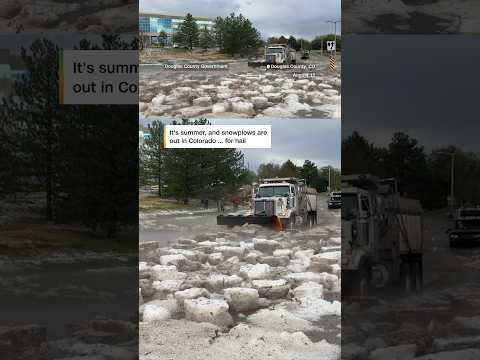 Mounds of hail cleared by snowplows
