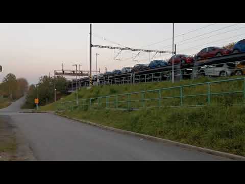 LONG train transporting cars in the Czech republic. Must see.