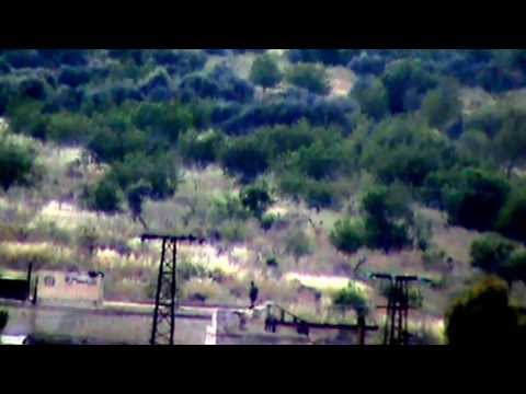 اشتباكات بين لواء درع الثورة وقوات النظام في معركة القصاص لأهلنا في بانياس في معمل القرميد