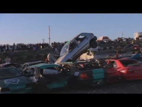 Car jumping championships: Drivers risk injury to jump 18 wrecked cars
