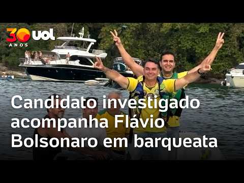 Flávio Bolsonaro tem Renato Araújo, candidato investigado, em barqueata de campanha em Angra