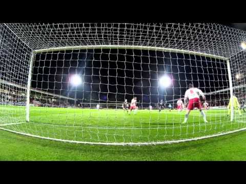 Behind the goal: Jack Thomas scores at Stevenage