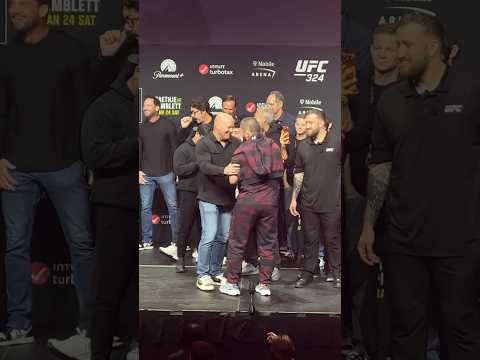 Khabib Nurmagomedov hugs Dana White at the UFC 324 ceremonial weigh ins