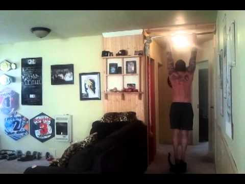 Chris champagne playing on pull up bar