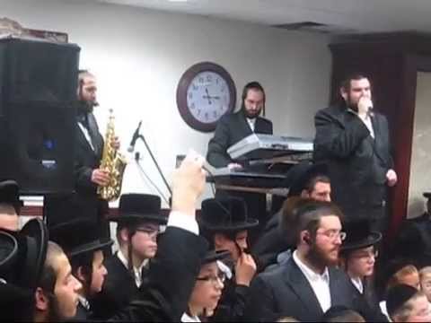 Shmily Unger and Hershy Segal and Avrumy Kletskin at a simches Beis hasheivo. הרשי סגל שמילו אונגר