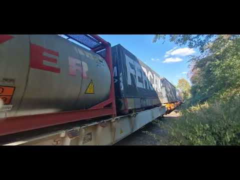 Hgk Köln Schweizer d lok mit hupac klv Aufliegerzug von niehl  an der Brücke simonskaule (longerich)