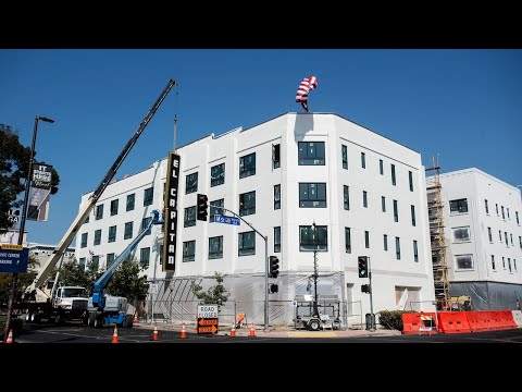 Installation of new sign on historic El Capitan Hotel in Merced