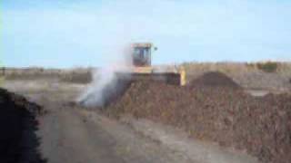 preview picture of video 'Windrow Composting Turner Sewage Sludge and Yard Waste Organic Soil Amendments Landfill Diversion'