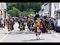 The Highlanders Pipes & Drums lead the Queen's Guard of Honour through Ballater to barracks Aug 2018