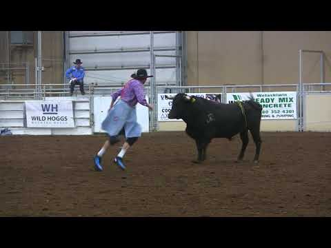 Kris Buffalo jumps a fighting bull in Ponoka
