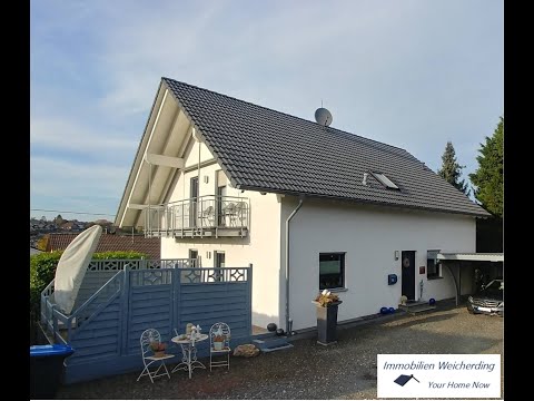 Neuwertiges Niedrigenergiehaus mit zwei Wohneinheiten in Konz präsentiert von Immobilien Weicherding