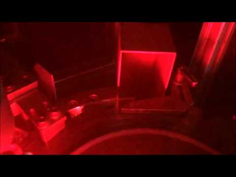 Selezione dadi su macchina a disco indexato. Controllo al 100%