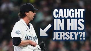 Logan Gilbert catches ball inside his jersey