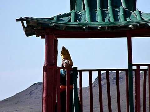 young monk calling the others, mongolia