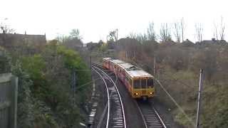 preview picture of video 'Tyne and Wear Metro-Metrocars 4026 and 4069 passing Bridge 1123 (Shiremoor)'