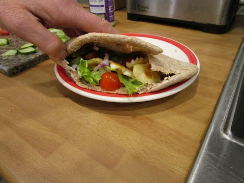 Fried Halloumi and chopped salad in pitta bread with yogurt and mint dressing