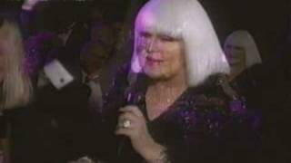 Miss Peggy Lee singing to her friend