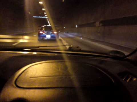 JDM cars racing in a tunnel in Germany
