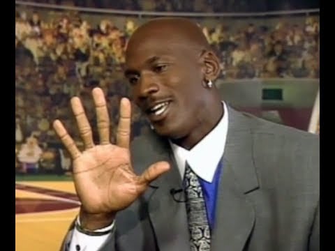 Gene Siskel asks Chicago Bulls' Michael Jordan about his hands (1996)