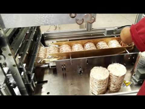 Automatic puffed rice cake packing machine