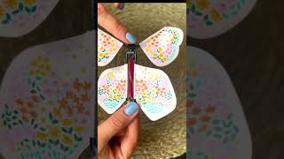 Létající motýl růžový na gumičku