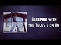 Billy Joel - Sleeping with the Television On (Lyrics)