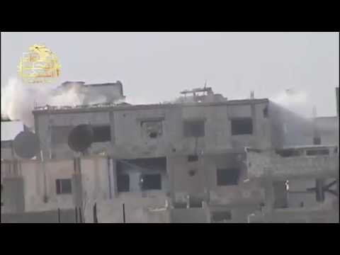 استهداف قوات النظام بقذائف الدبابة من قبل لواء توحيد الجنوب في حي المنشية في درعا