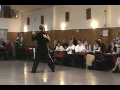  Virginia Gomez  and  Christian Marquez  are  dancing  to  the  tango  "  Dime Mi Amor  "