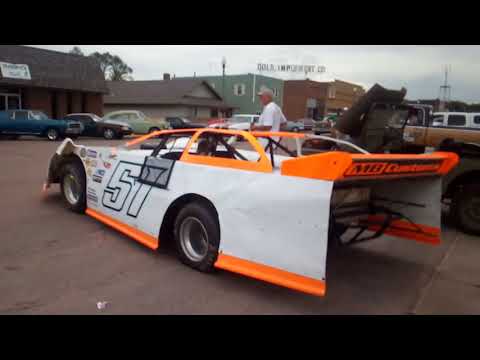 Howard, SD Auto show 6-8-19. A late model race car, and a bad boy mud truck.