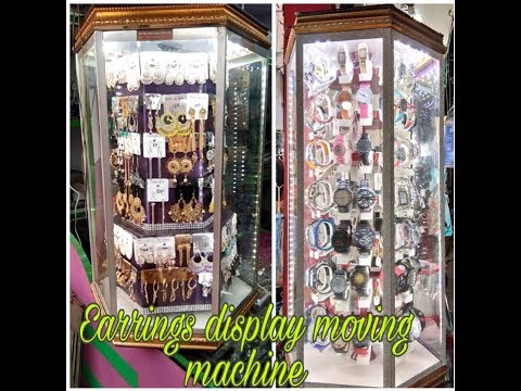 Rotating earring display stands