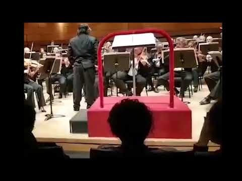 conductor losing trousers in milan concert