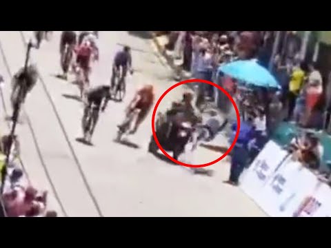 Cycling Race Chaos: Police Bike Causes Massive Crash! 🚴‍♂️😱