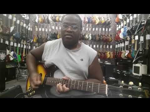 Playing a vintage 1964 Gibson Melody Maker at Guitar Center in Modesto California