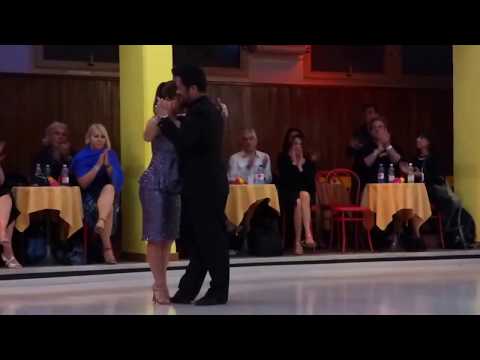  Lily Tan  and  Gennysam Alcantara  are  dancing  to  the  vals  "  Ilusion Azul  "  by  Alfredo De Angelis  at  Salonissimo Savona Tango Festival  in  2017