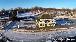 preview picture of video 'Thousand Islands Park Pavilion Flyover Frozen River'