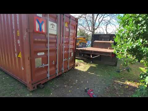 Part of a video titled How To Move A Shipping Container By Yourself At Home - YouTube