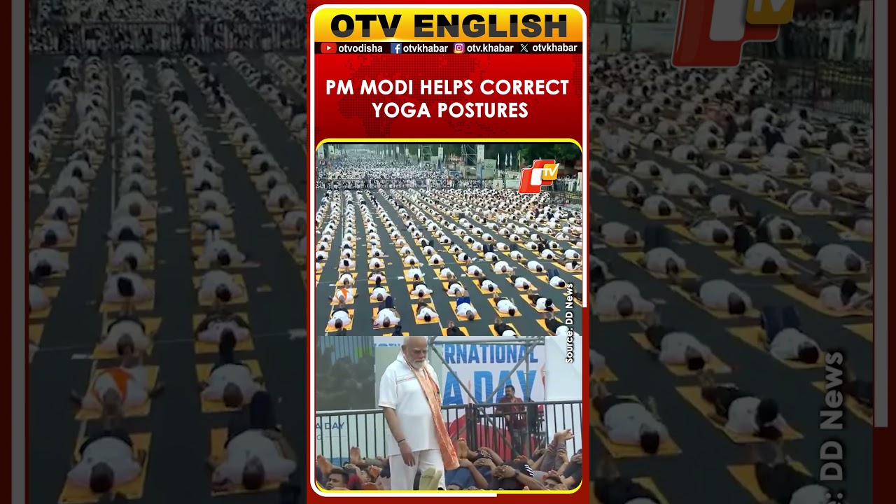 Prime Minister Modi Helps Correct Yoga Postures In Kolkata