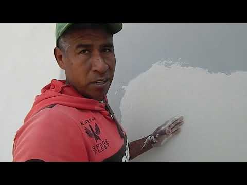 How to apply stucco over a wall with paint